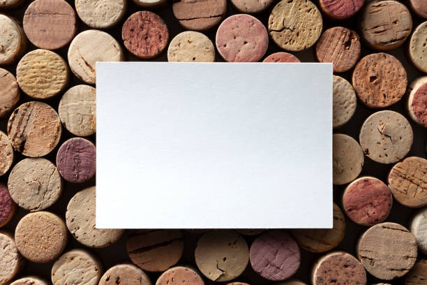 Corks with blank paper sheet Variety of corks with paper label. ground stopper stock pictures, royalty-free photos & images