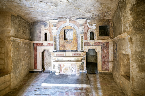 Cavassa Chapel (16th century), in the cloister of San Giovanni, with the funeral monument of Galeazzo Cavassa decorated with frescoes