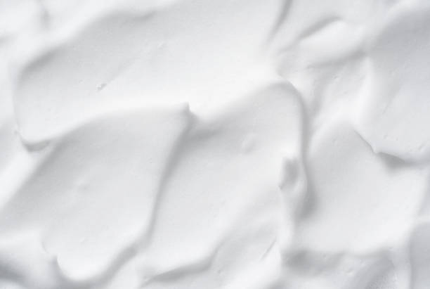 istock Foam bubble from soap or shampoo washing on top view. 1396989074
