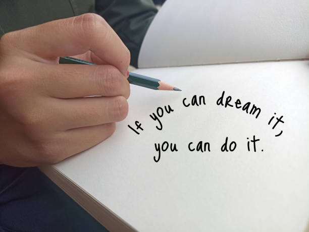 istock If you can dream it, you can do it. With hand pointing on a paper. 1396991257