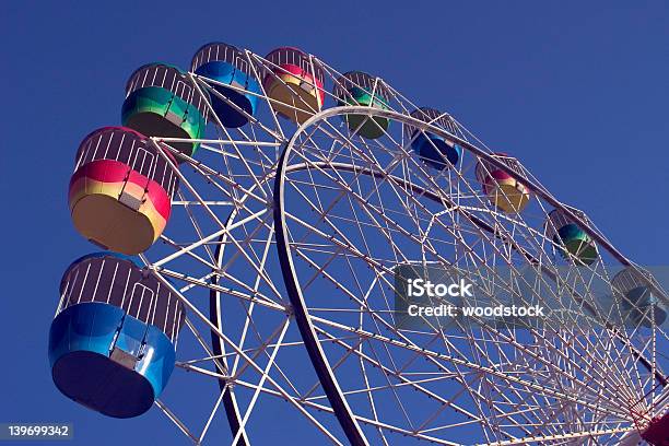 A Huge Ferris Wheel On A Sunny Day Stock Photo - Download Image Now - Agricultural Fair, Amusement Park, Amusement Park Ride