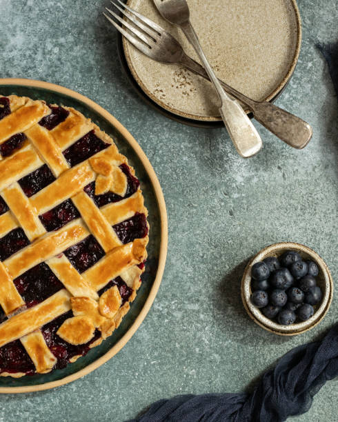 istock Blueberry pie decorated with a lattice of dough 1396995146