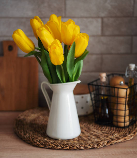 istock Beautiful tulip flowers  on table at kitchen 1396996252