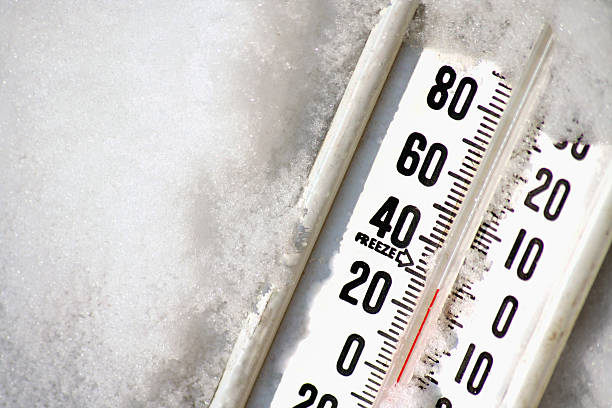 Close-up of frozen thermometer at 30 degrees Fahrenheit a thermometer in snow centimeter photos stock pictures, royalty-free photos & images