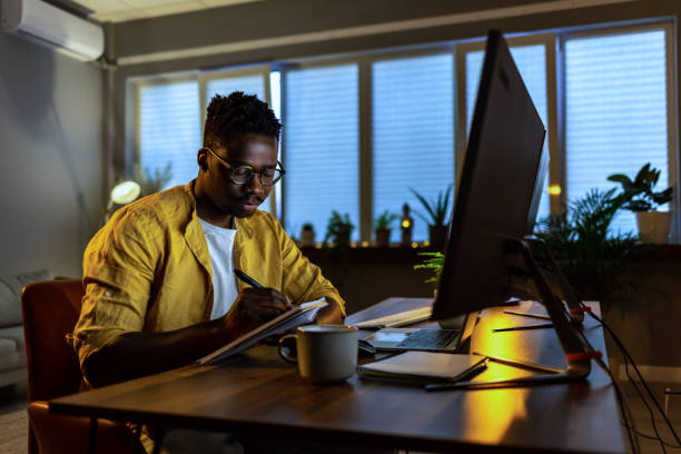 istock Pensive man working on laptop in office 1396998103
