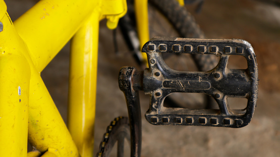 children's bicycle pedals, which look a little dirty