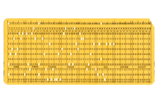 High resolution image of a vintage punched card used for early computing data storage