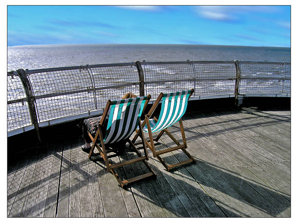 Deckchairs,Blackpool Pier stock photo