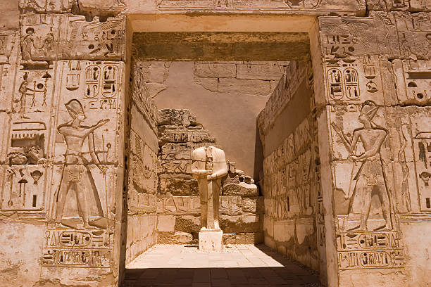 Medinet Habu The mortuary temple of Ramses III, Pharaoh of Egypt, at Medinet Habu, Luxor (Thebes) medinet habu stock pictures, royalty-free photos & images