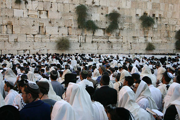 western wall at dawn western wall in old city jerusalem. took at dawn of Yom Kipur.many orthodox peaple come and pray in the holyest place to jews nir stock pictures, royalty-free photos & images
