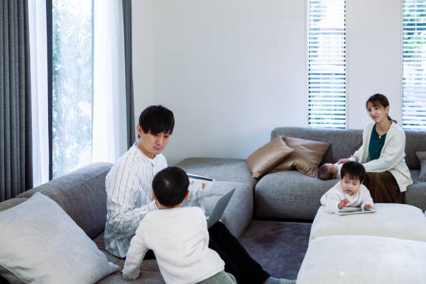 istock Father working from home with his family . 1397006223
