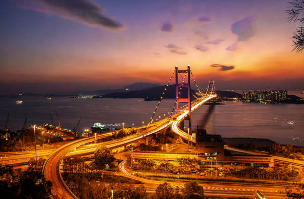 istock The car light trails of Tsing Ma Bridge after sunset. 1397007487