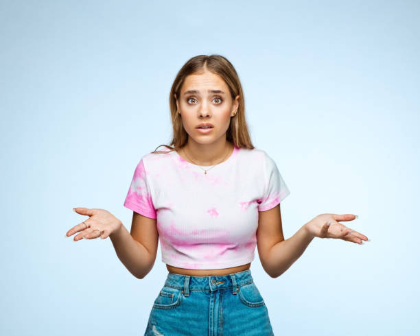 Blond girl with surprised facial expression