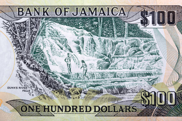 Dunn's River Falls from Jamaican money Dunn's River Falls from Jamaican money - Dollar dunns river falls stock pictures, royalty-free photos & images
