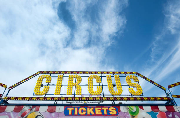 Canterbury, England, 28 May 2023: Close up of stuffed animal toys and dartboard at British funfair stall in Canterbury England on 28 May 2023.