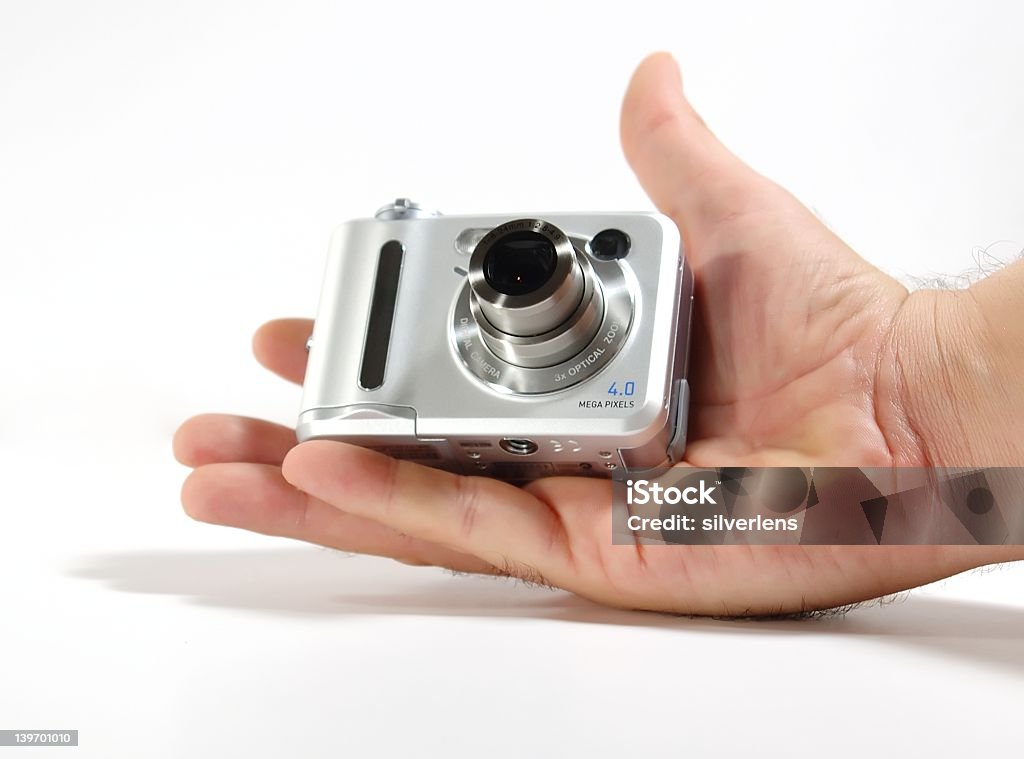 digital camera digital camera in hand Camera - Photographic Equipment Stock Photo