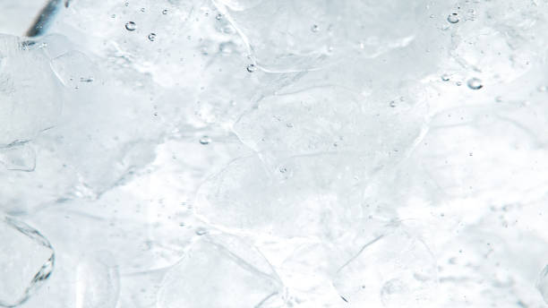 istock Close up of ice cubes underwater, blue background. 1397010257