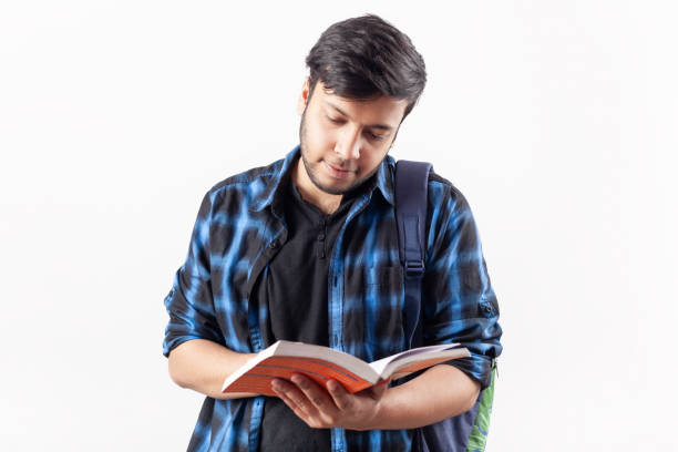 istock adult student concentrating on reading book 1397011322