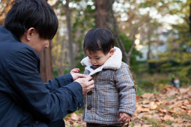 istock Father and son spending the afternoon in the park 1397012629
