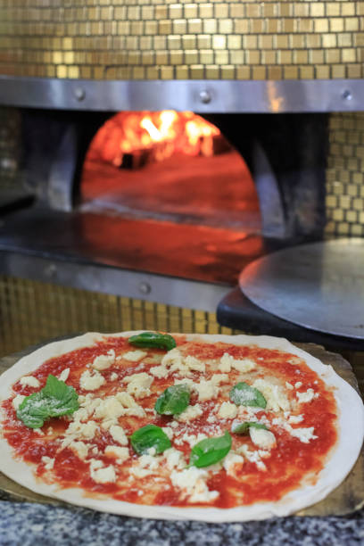 istock Hands preparing Italian true Neapolitan pizza in Napoli 1397014532