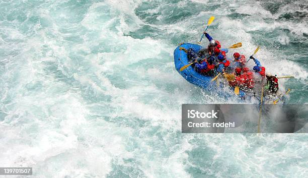 People In A Blue Inflatable Boat River Rafting Stock Photo - Download Image Now - Teamwork, Sports Team, Rafting