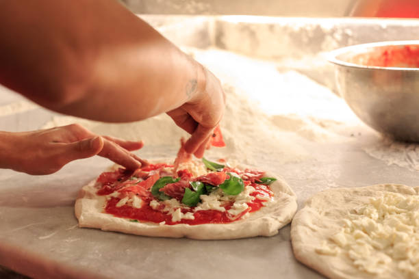 istock Hands preparing Italian true Neapolitan pizza in Napoli 1397015204