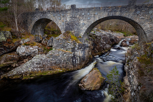 The Silver Bridge and Black Water Falls in Garve, Scotland UK