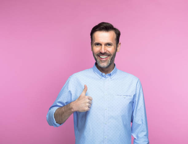 istock Happy man showing thumbs up 1397016844