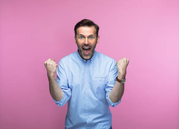 Happy man with clenched fists