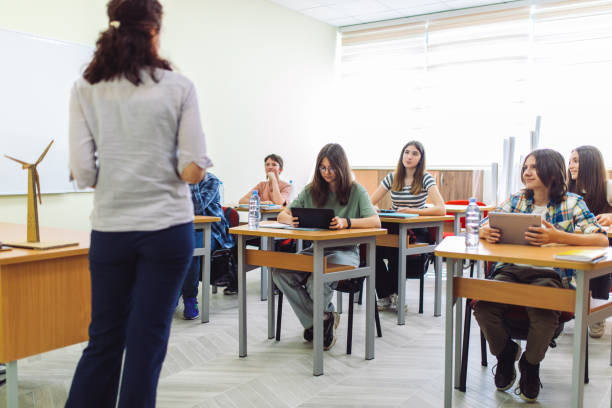 istock High school students on class in school listening their teacher 1397017816