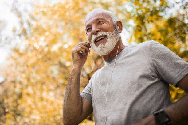 istock Smiling senior man doing morning jogging 1397017879