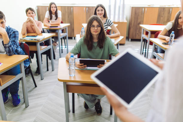 istock High school students on class in school listening their teacher 1397017947