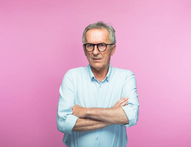 istock Serious retired senior man with arms crossed 1397019516