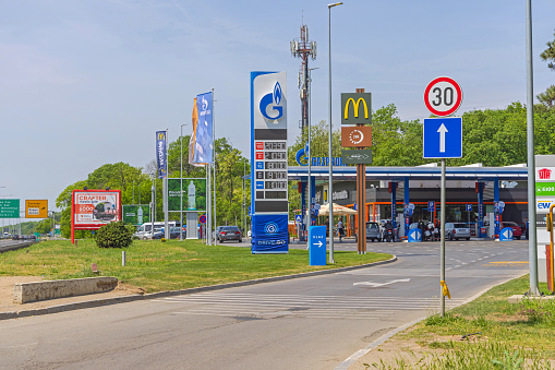 Belgrade, Serbia - May 08, 2022: Entrance Way to Renovated Petrol Station Zmaj at Highway Gazprom Neft Russian Petroleum Company.