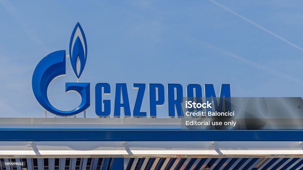 Russian Petroleum Gazprom Belgrade, Serbia - May 08, 2022: Russian Petroleum Company Sign Gazprom at Petrol Station Over Blue Sky. Gazprom Stock Photo