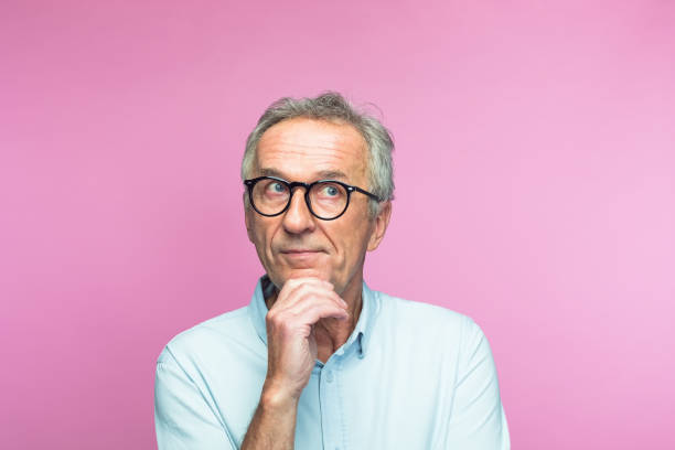 istock Thoughtful man with hand on chin looking away 1397019719