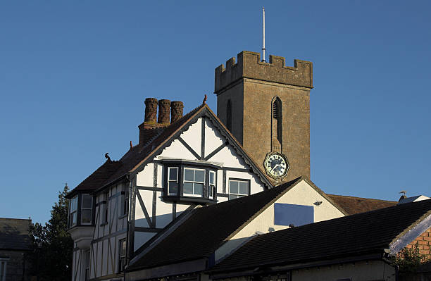 istock church clock tower with timber building 139702095