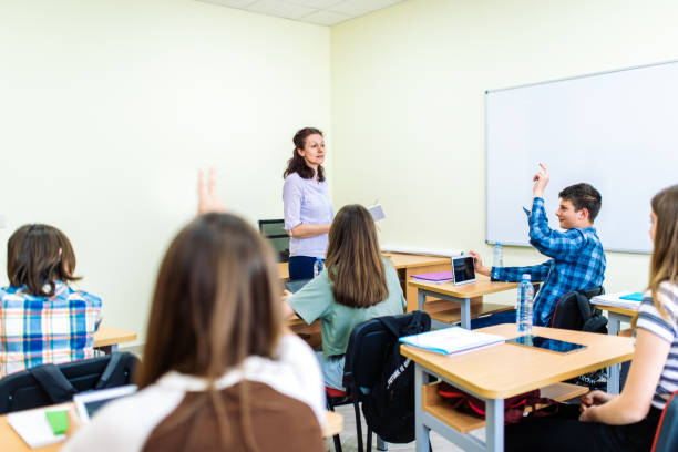 istock High school students on class in school listening their teacher 1397021008