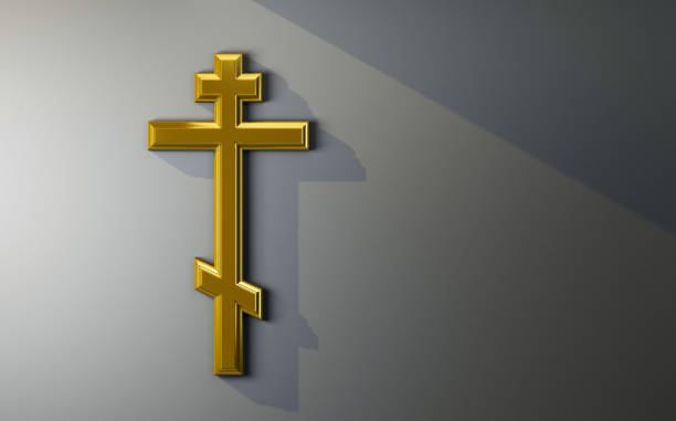 istock golden orthodox cross on black copy space 1397021836