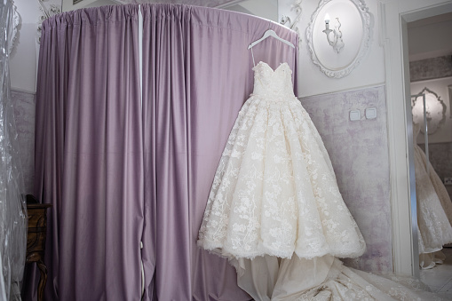 Wedding dressess in a luxury bridal shop