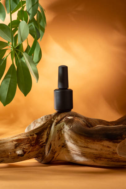istock Black nail polish on orange background 1397022340