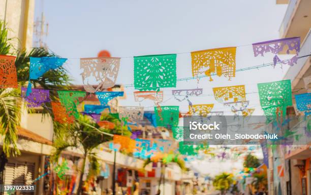 Flags Are Waving On The Street Of Small Mexican Town Stock Photo - Download Image Now