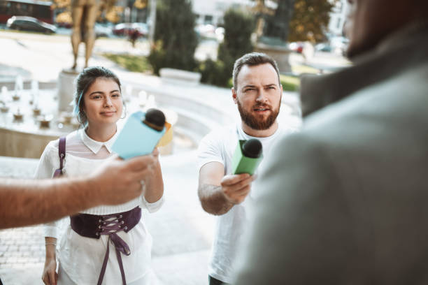 istock African Male Giving Statement To Press Outside 1397025038