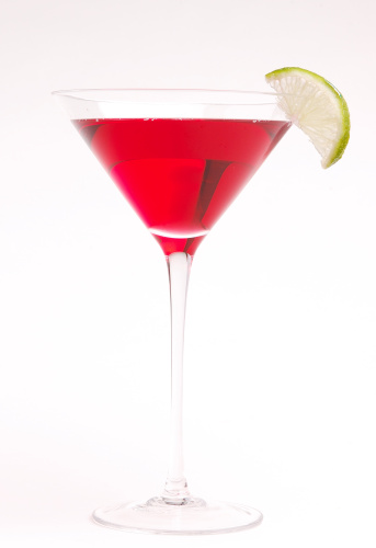 Red Cocktail with a lime wedge