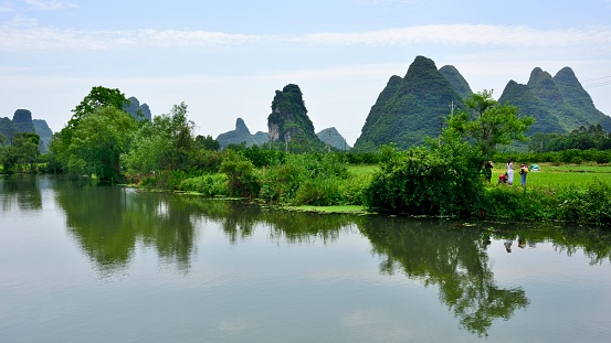 China,Guilin,Lingui county,rural areas.\nThe scenery here is like a quiet and happy ink painting, which is both layered, clean and simple, walking in the landscape, as if into the painting.