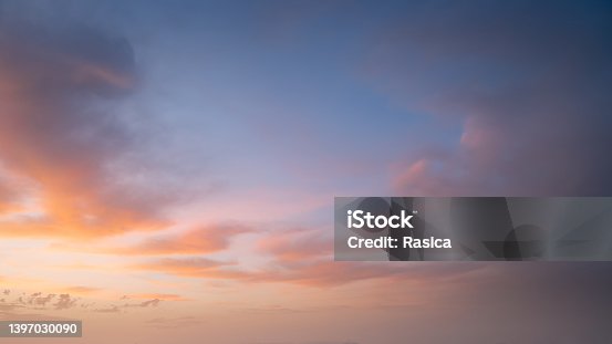 istock Colorful pastel sky with clouds at beautiful sunset as natural background. 1397030090