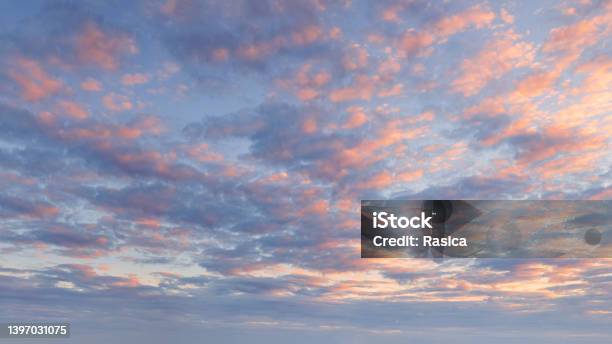 Pink Blue Sky With Fluffy Clouds At Beautiful Sunset As Natural Background Stock Photo - Download Image Now