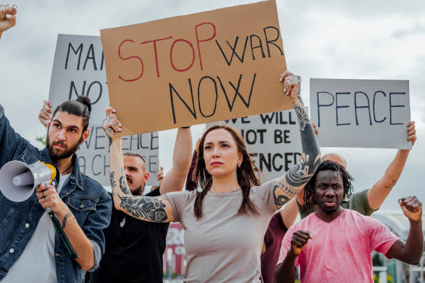istock People are marching on strike against war 1397032700