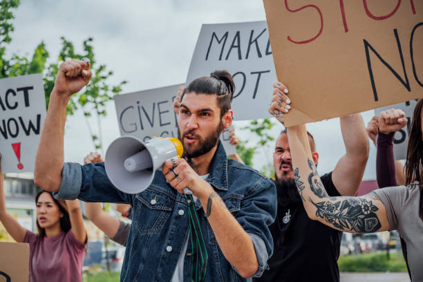 istock Young man during a demonstration in the street 1397033240