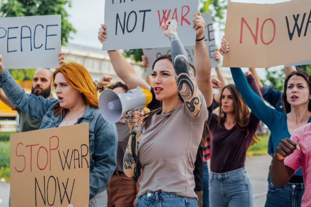 istock People are marching on strike against war 1397033793